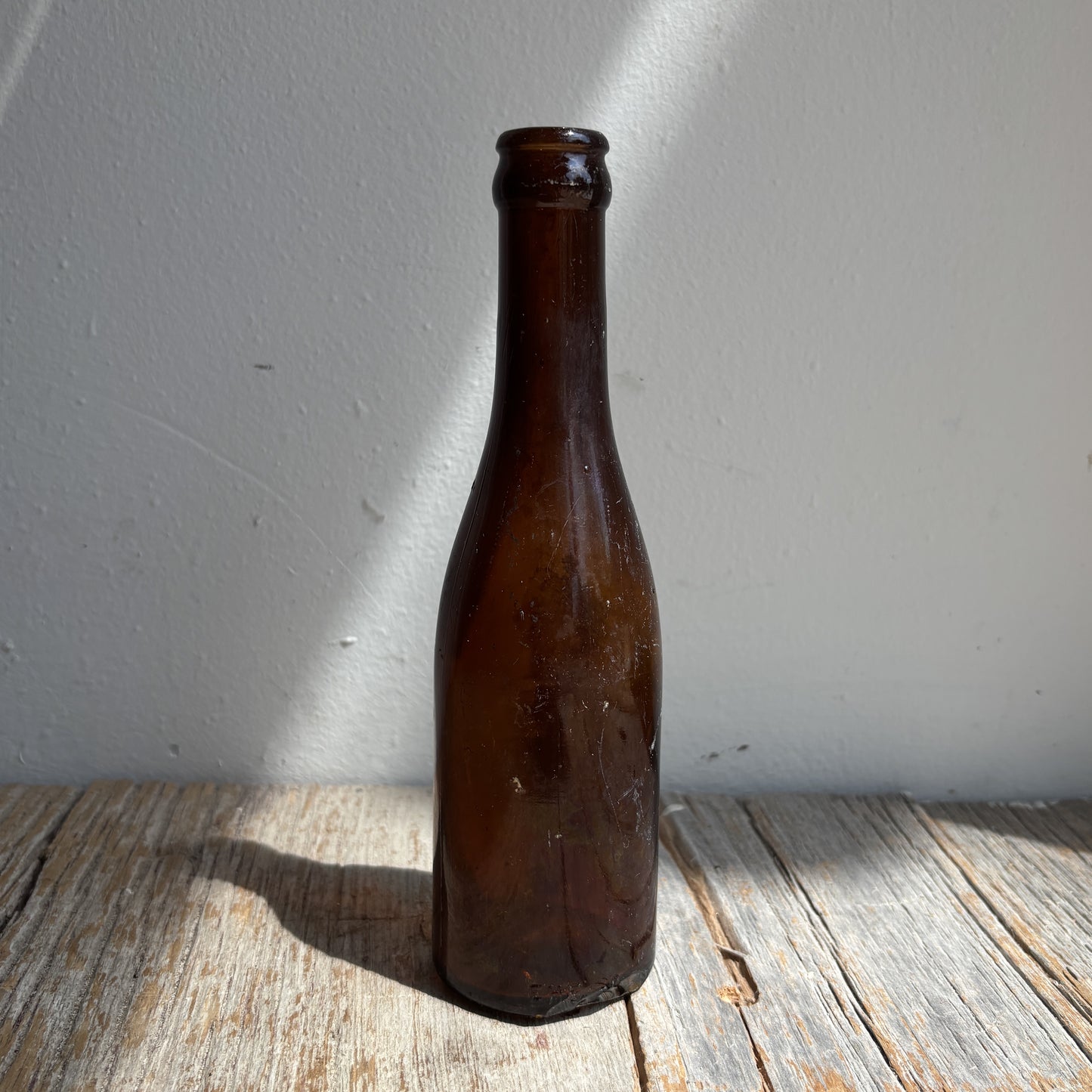 Antique Red Raven Splits Amber Glass Bottle