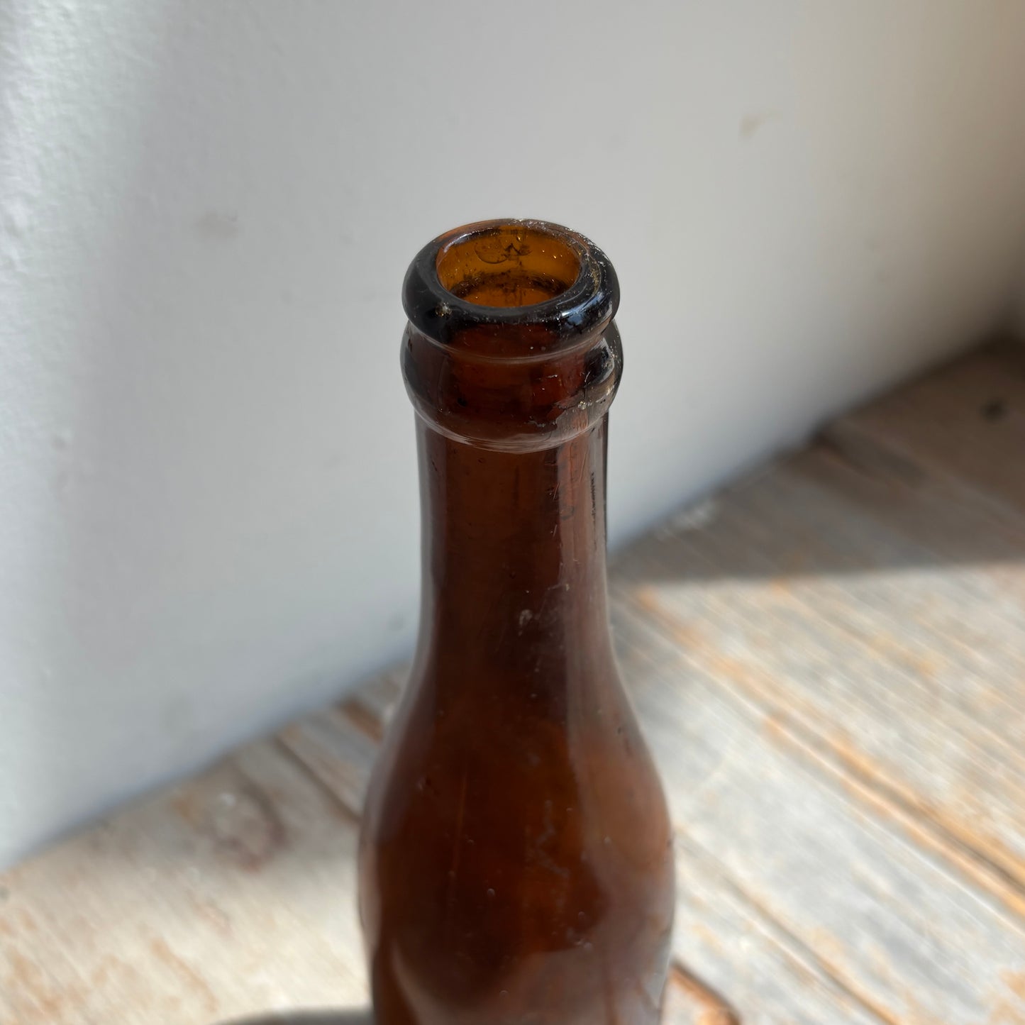 Antique Red Raven Splits Amber Glass Bottle